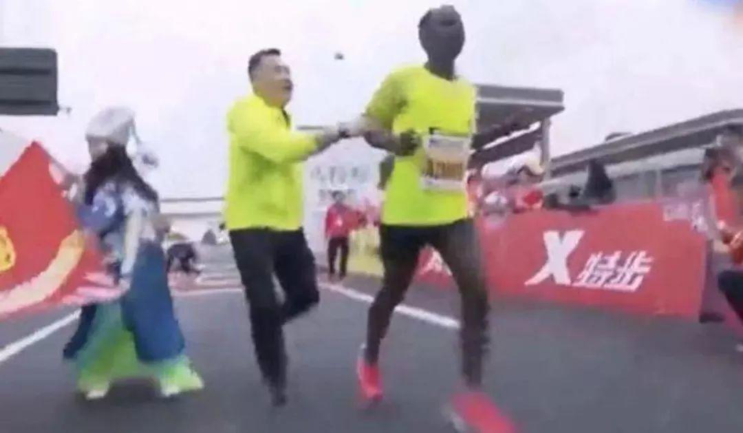 Ethiopian Forced to A Stop at Finish Line! Marathon Drama!